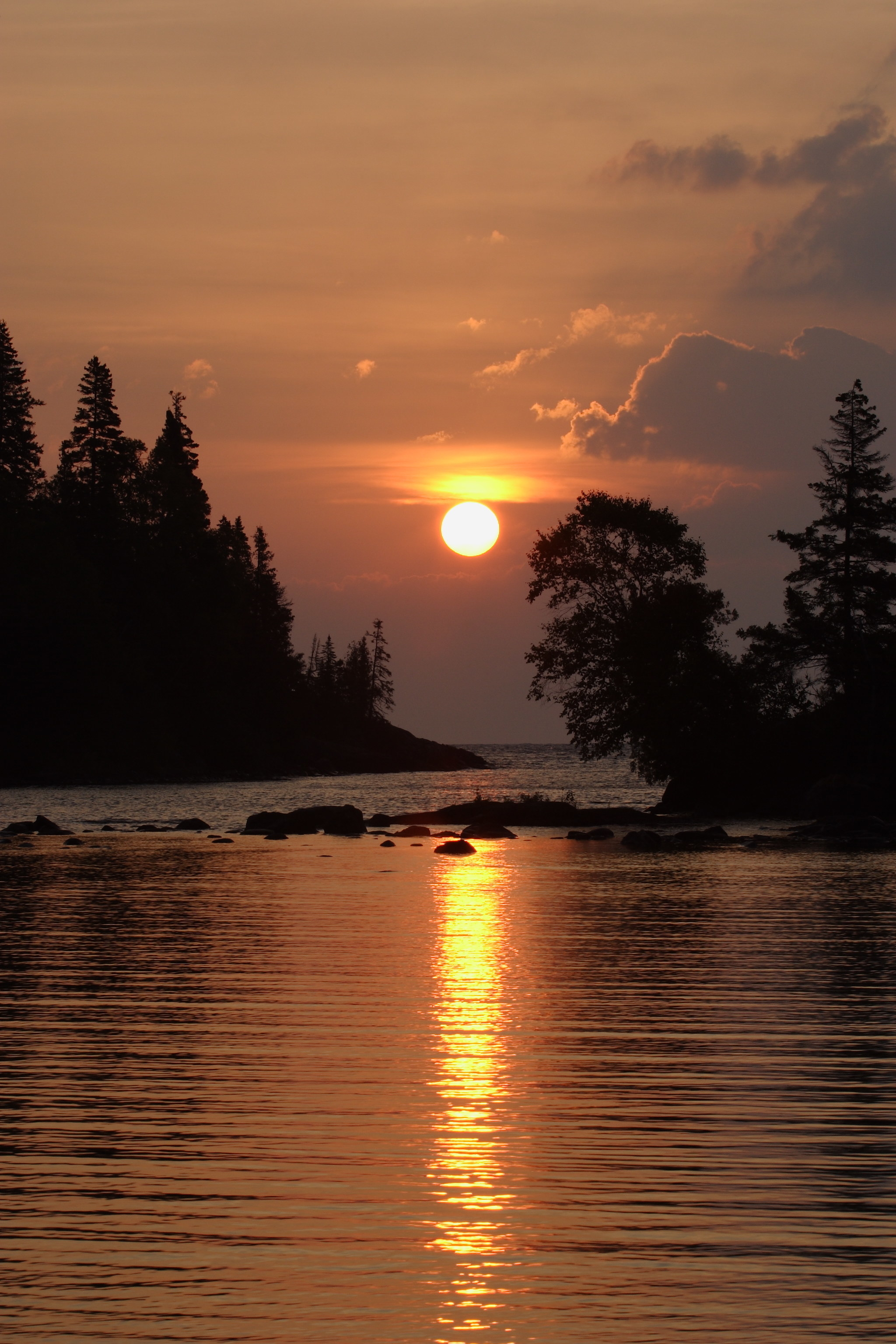 The sun setting over a lake in Isle Royale National Park.