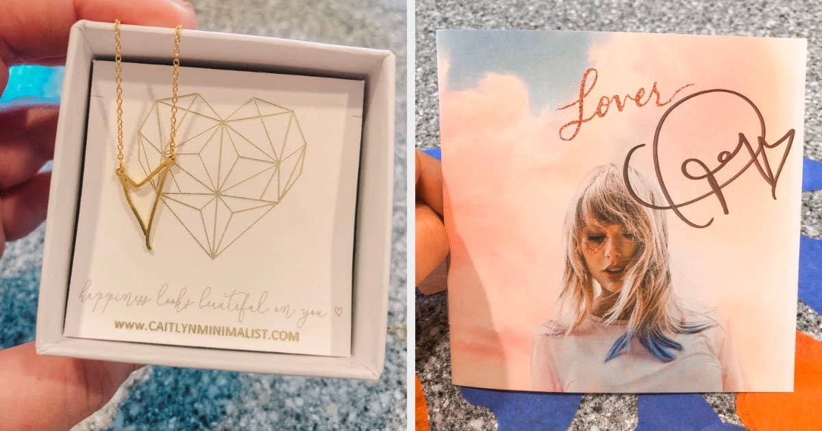 to the left: a personalized gold heart necklace, to the right: a signed taylor swift lover album