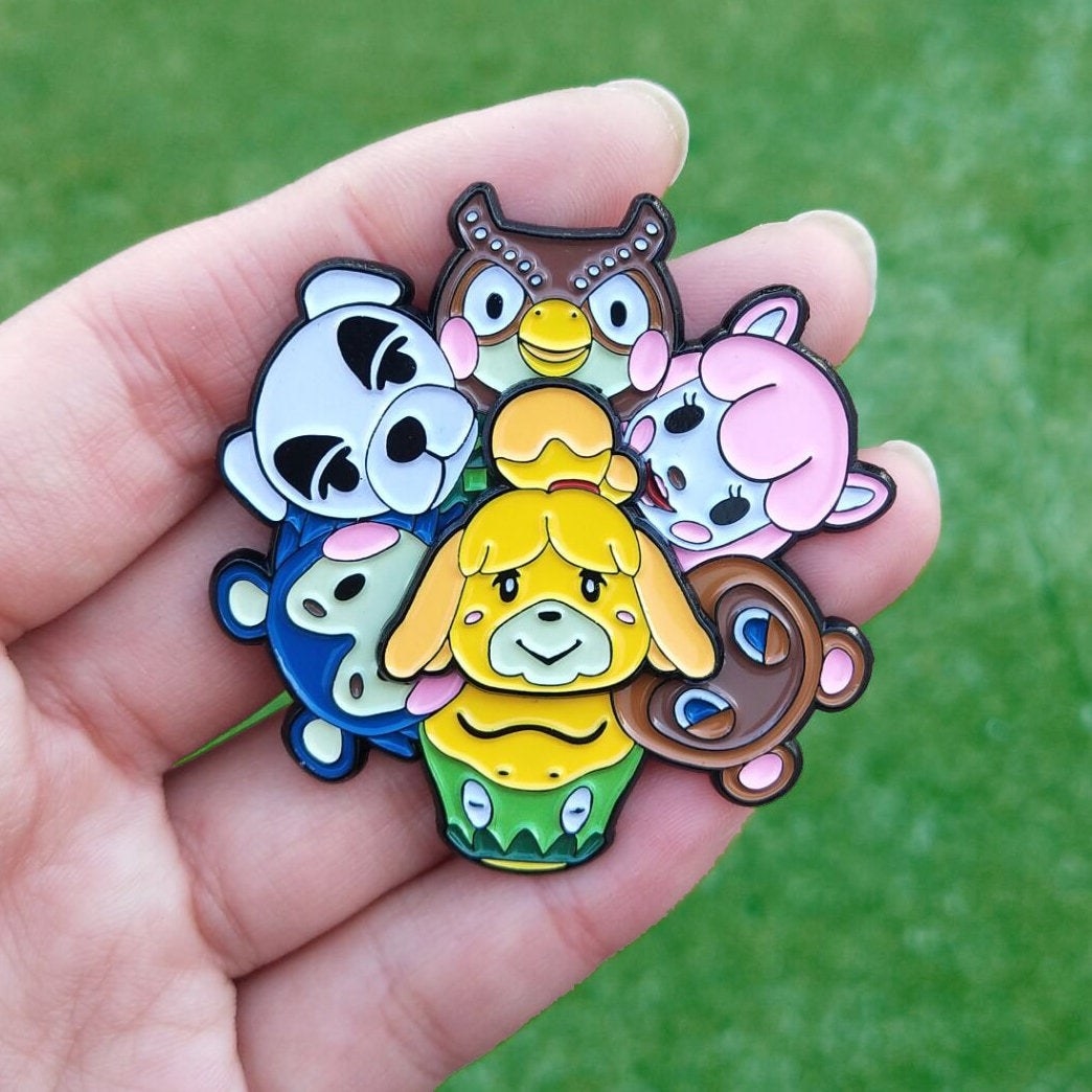 a spinning pin featuring various characters from the animal crossing game