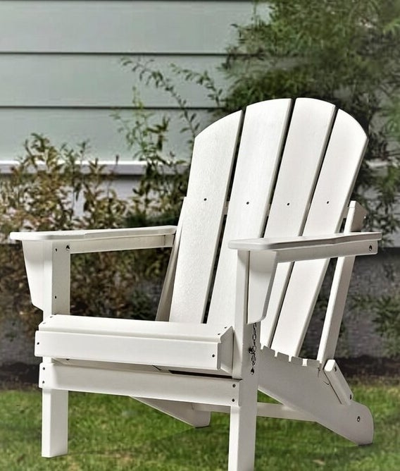 white Adirondack chair with movable joints to fold