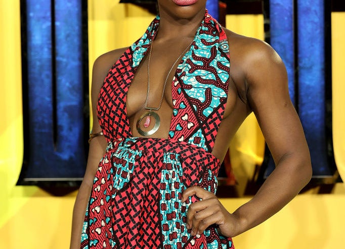 A profile photo of Michaela Coel posed on the red carpet.
