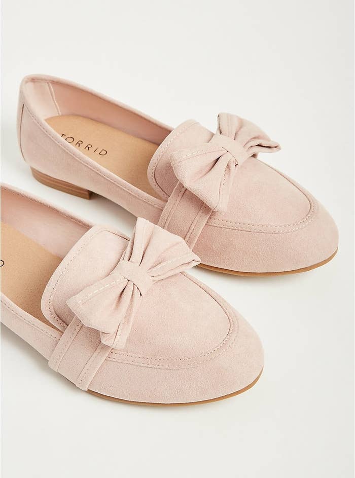 A pair of faux suede shoes with a tiny heel 