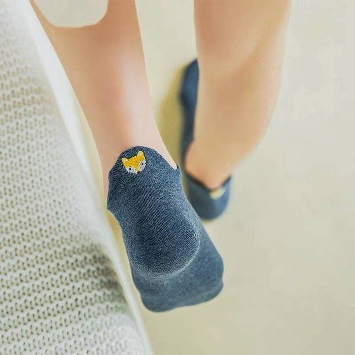 blue ankle socks with a tiny fox embroidered on the back