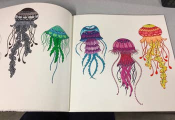A reviewer photo of a jellyfish coloring page, intricately completed with the pens