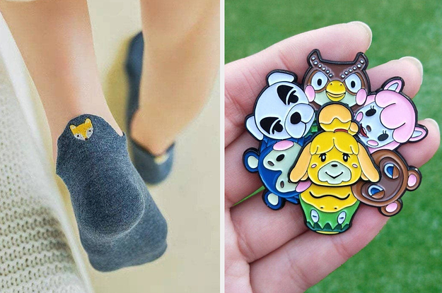 to the left: a blue ankle sock with a fox embroidered on the back, to the right: a spinning animal crossing pin