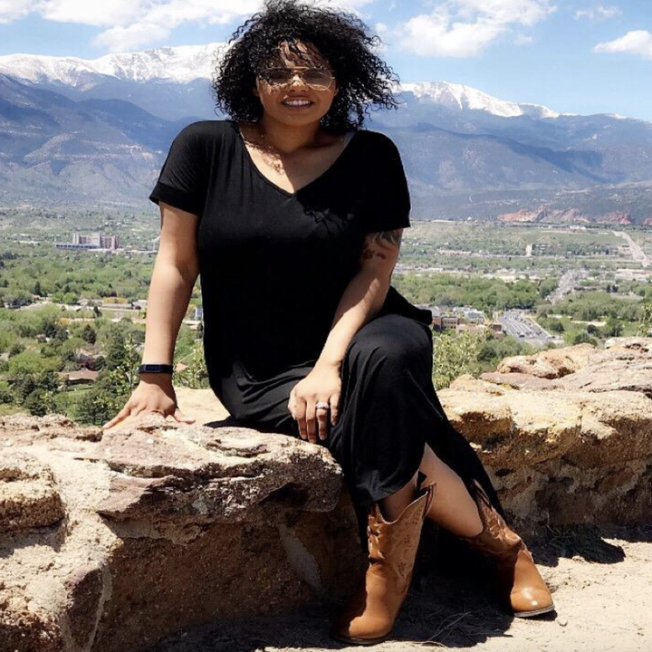 reviewer wearing black dress
