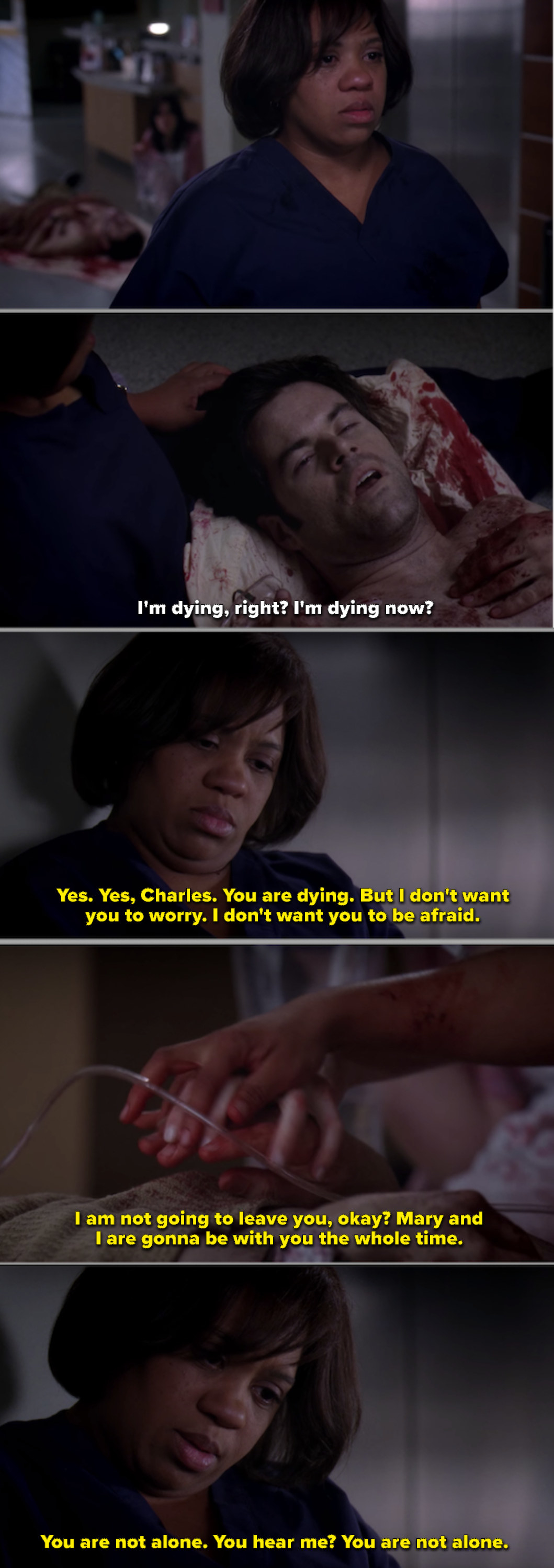 Dr. Bailey comforting Charles as he bleeds out in the hallway