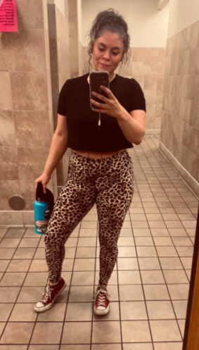 Reviewer wears a pair of high-rise leopard-print leggings to the gym
