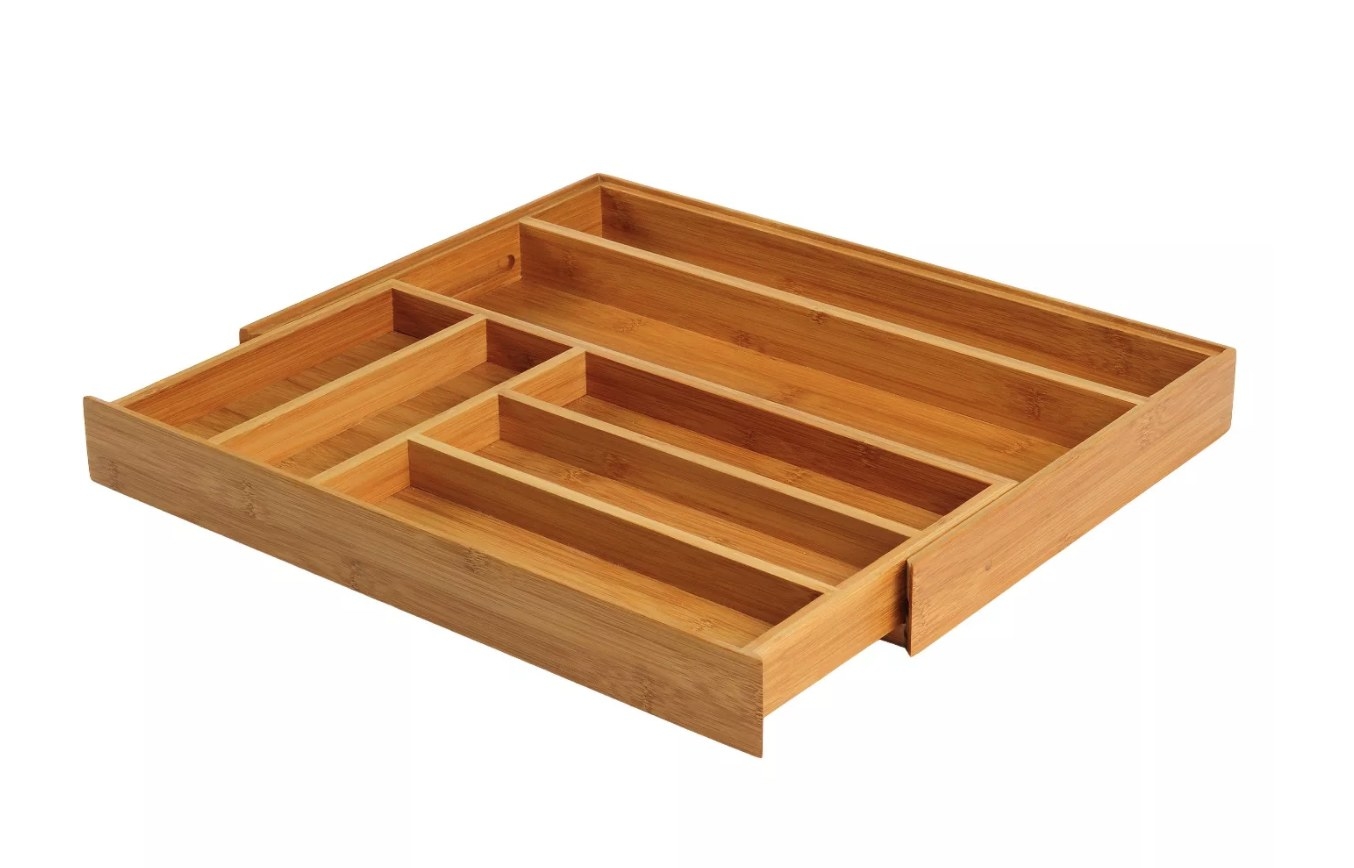 A bamboo organizer up to seven spaces for storage