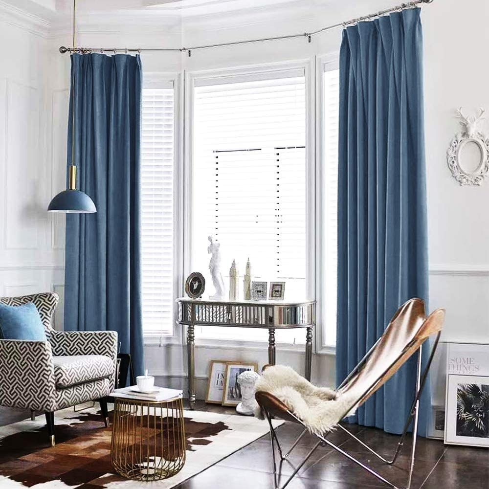 The light blue velvet curtains 