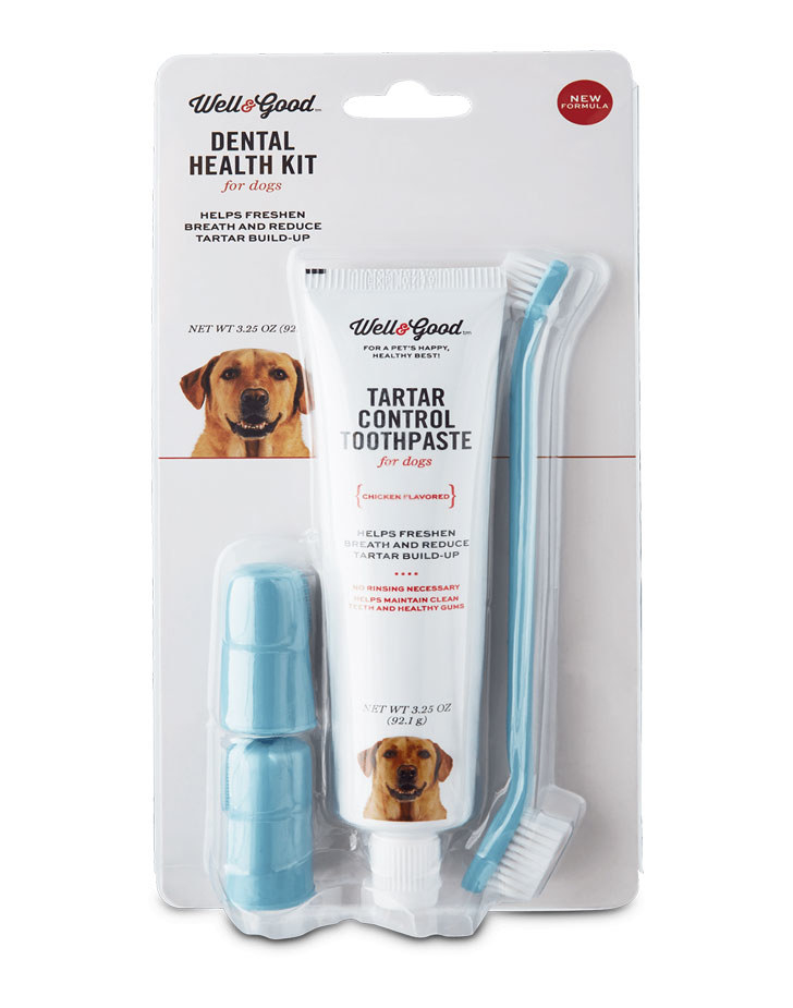 A dental health kit with chicken flavored toothpaste, a long angled toothbrush, and a finger brush.