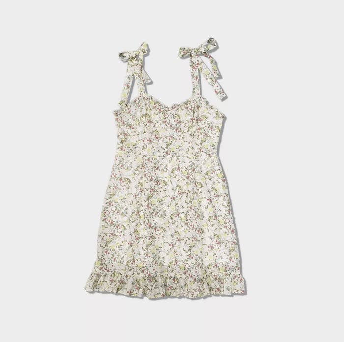 an off-dress with tied straps covered in tiny florals