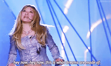 gif of Hilary Duff in &quot;The Lizzie McGuire Movie&quot; singing &quot;hey now hey now, this is what dreams are made of&quot;
