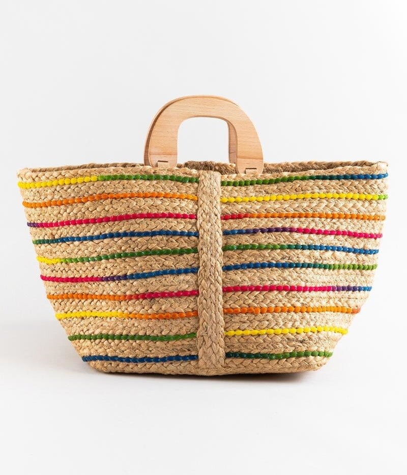 The large tote with wooden handles and different color stripes woven into it