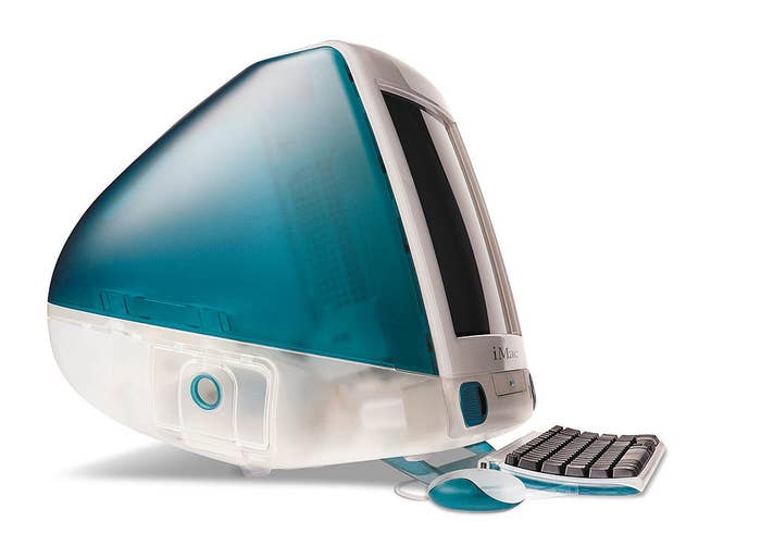 A photo of a teal blue Apple iMac from 1998
