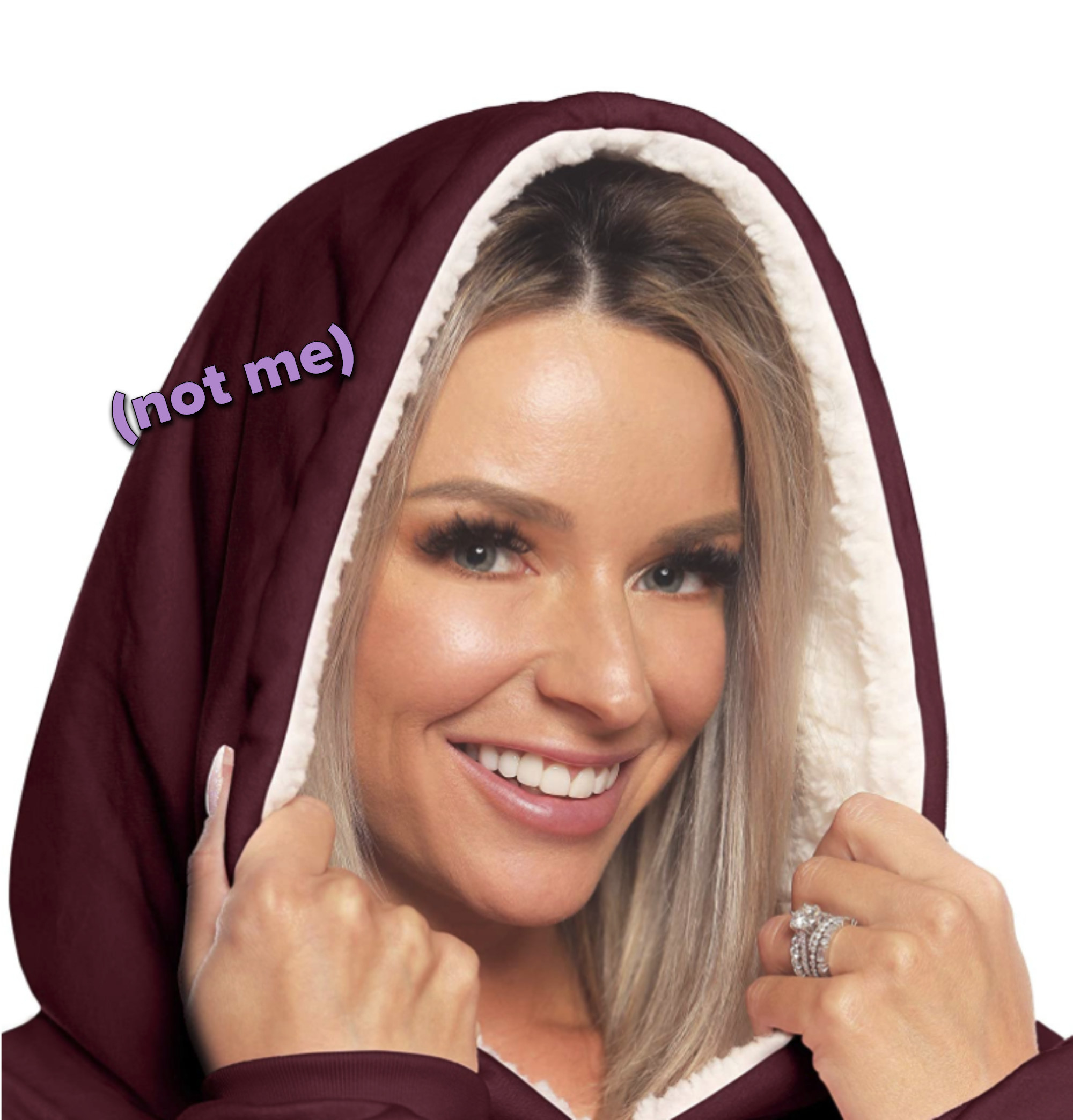 Close up of model&#x27;s smiling face, holding a sherpa-lined hood over her head