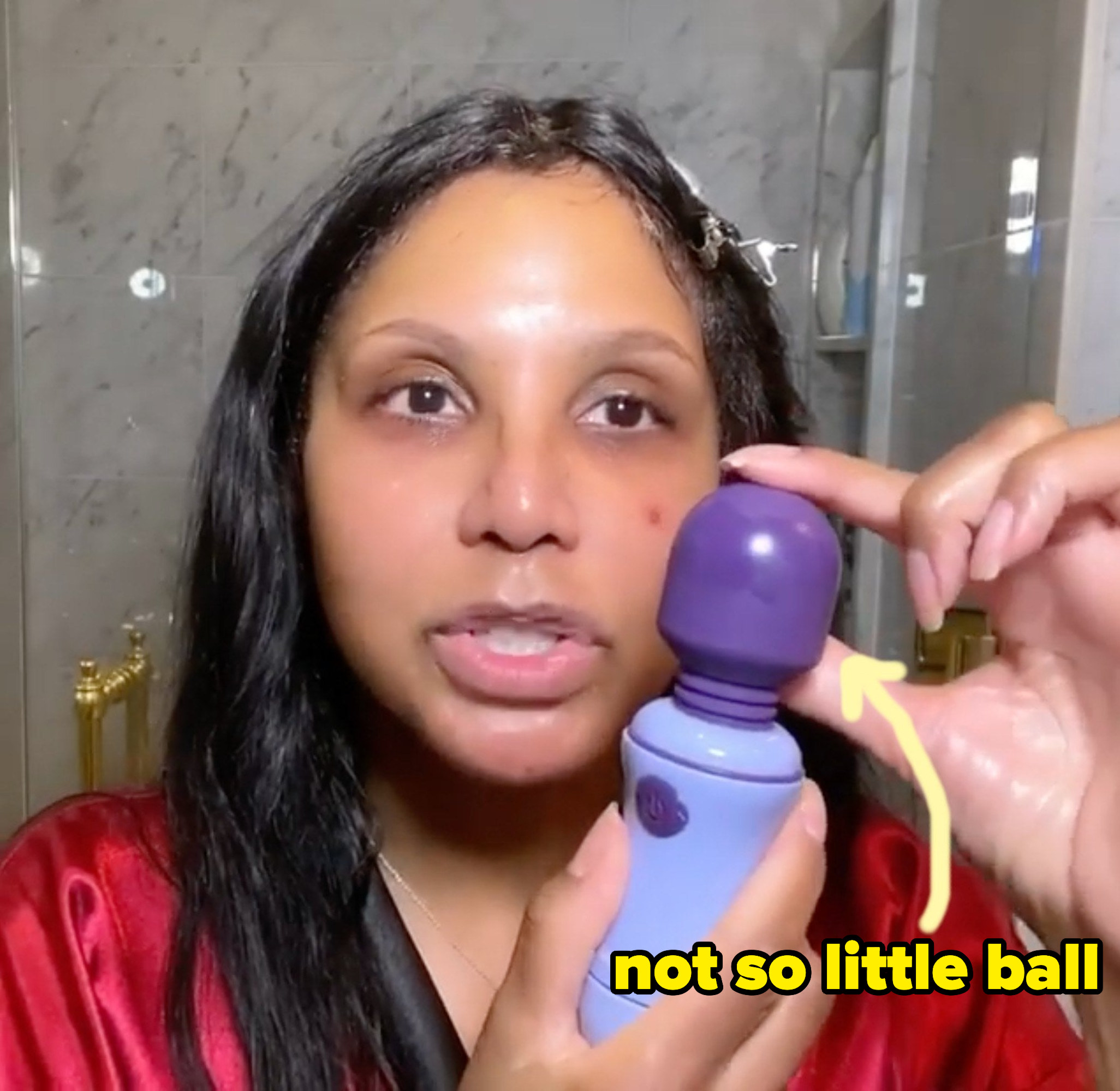 Toni touching the ball on her vibrator