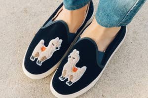 Velvet sneakers with llamas on them