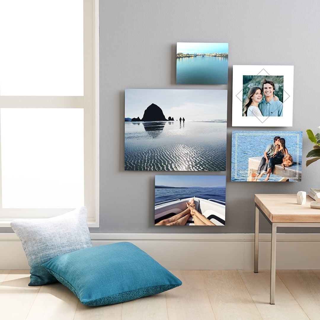 A gallery wall with different sizes of canvas prints