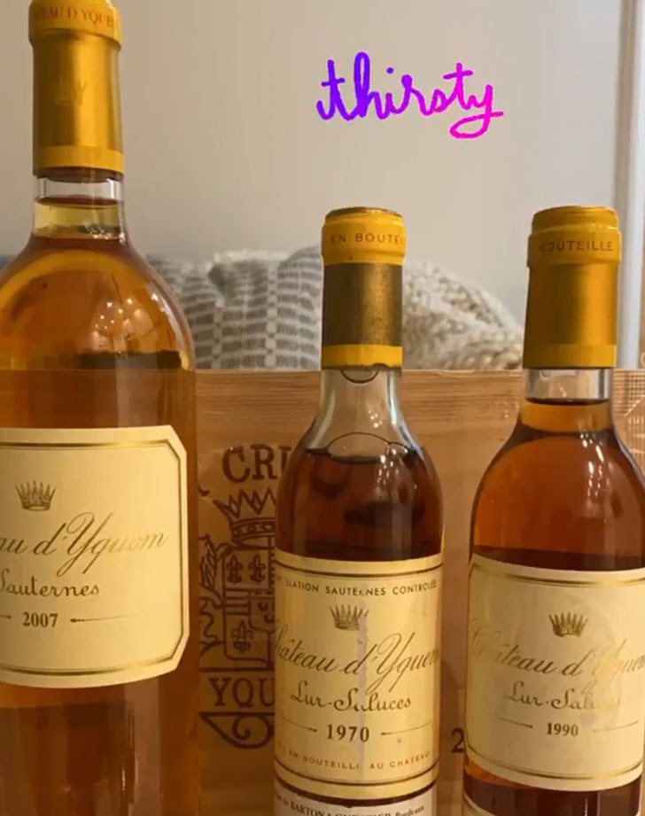 Three bottles of sweet Chateau d&#x27;Yquem dessert wine.