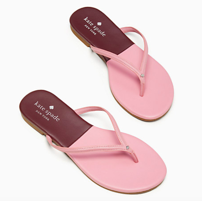 A pair of the cabana leather flip flops in pink/cherrywood.