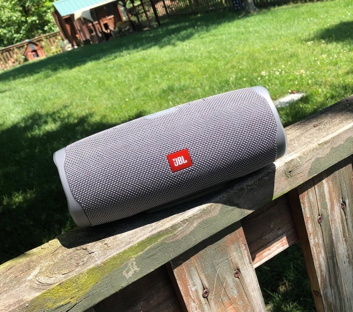 The cylindrical speaker in gray