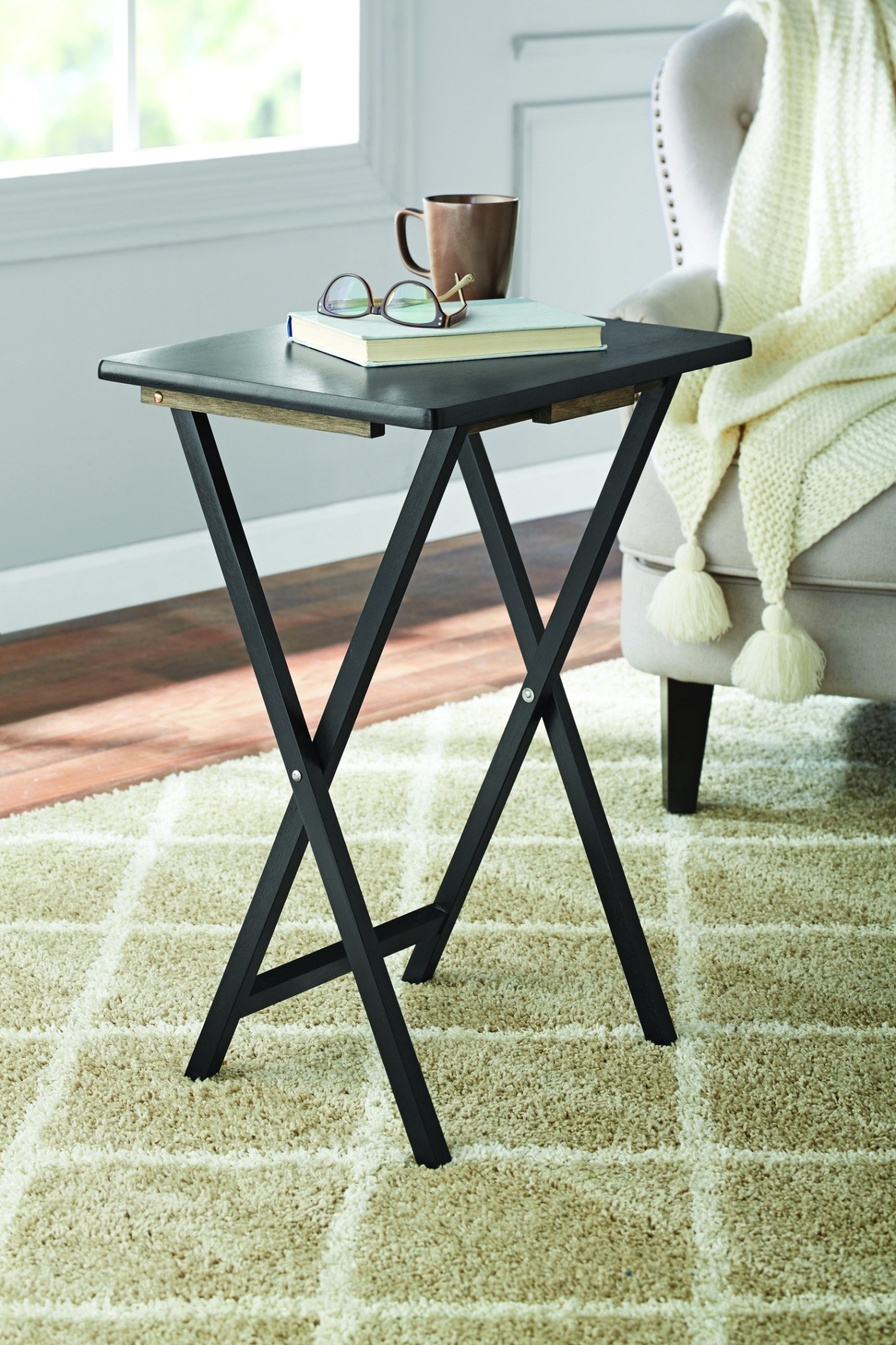 black tray table with tall legs 