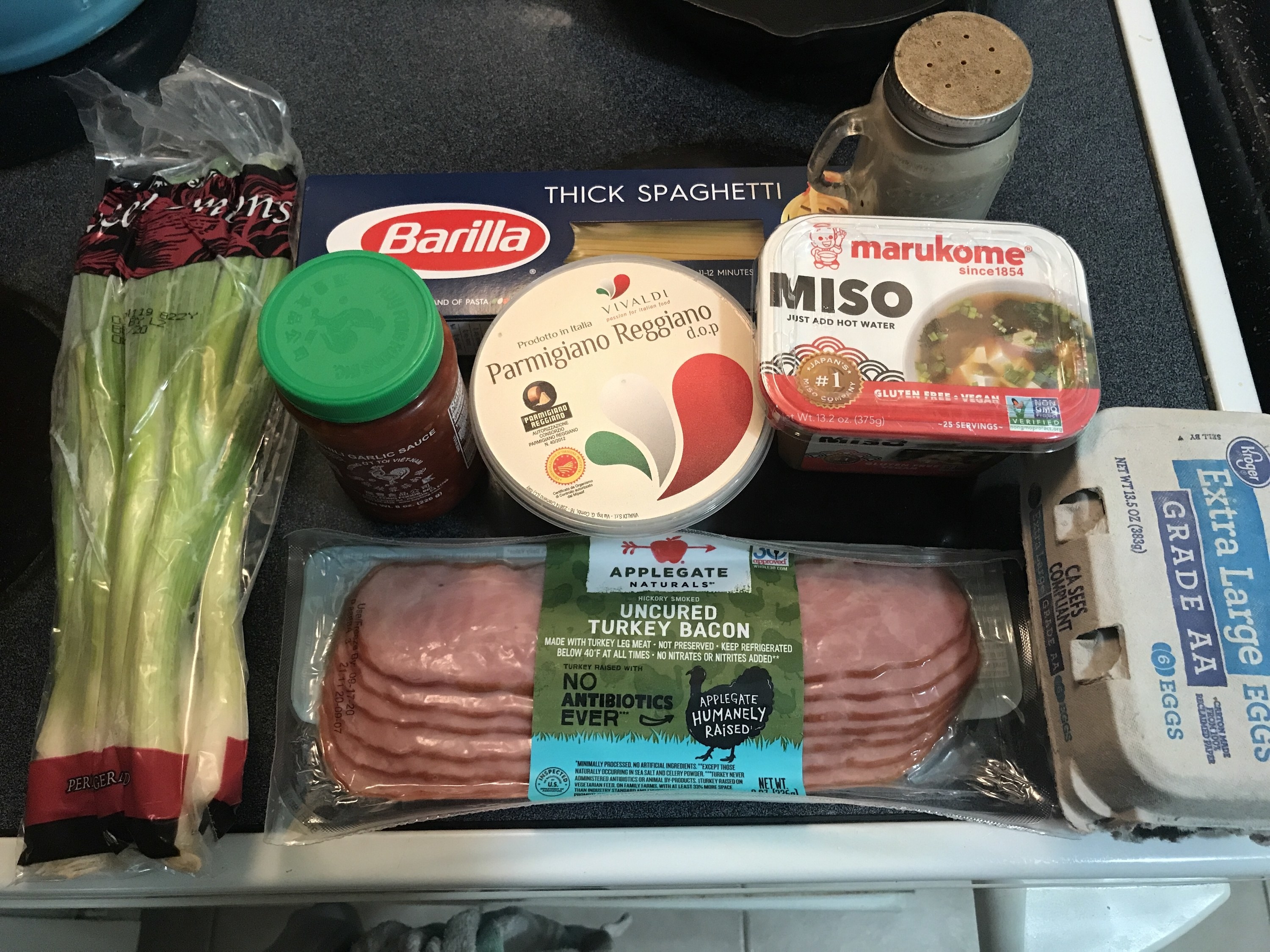 ingredients for spicy miso pasta laid out flat