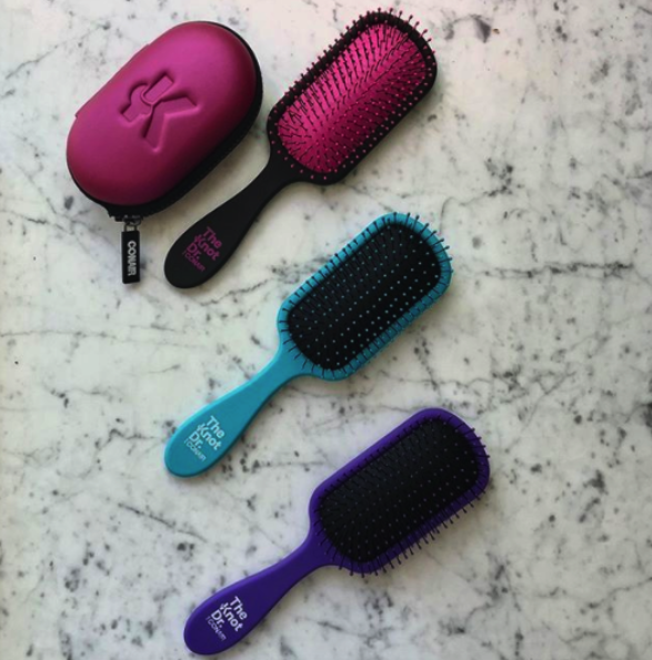 Three hairbrushes