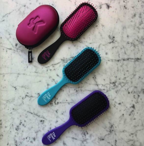 Three hairbrushes