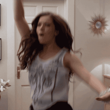 Gif from Pitch Perfect of hailee steinfeld dancing excitedly 