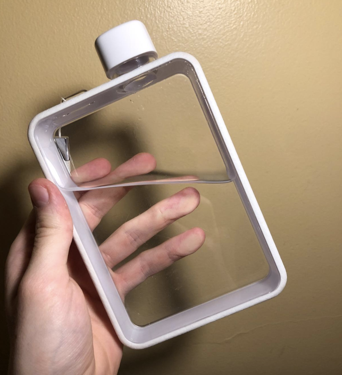 reviewer photo of clear travel flask 