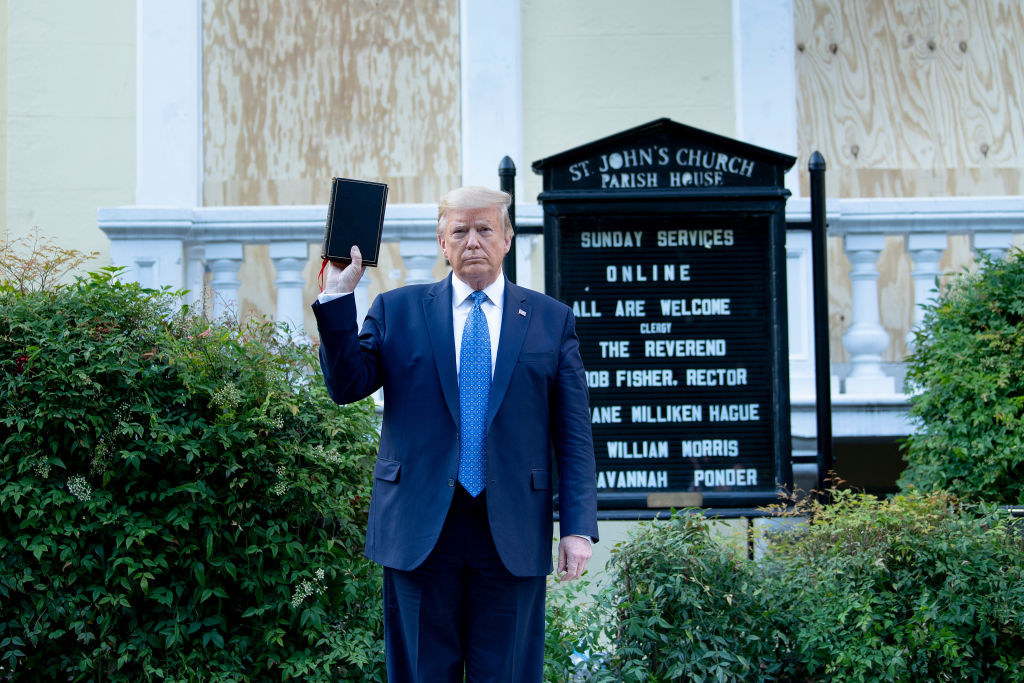 Photo of Trump holding a Bible in front of the church where he famously tear-gassed protestors