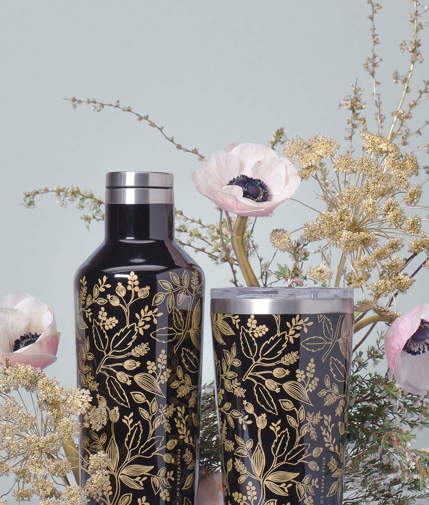 the black and floral bottles 