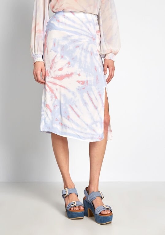 The blue, white, and coral skirt with a slit that comes to above the knee