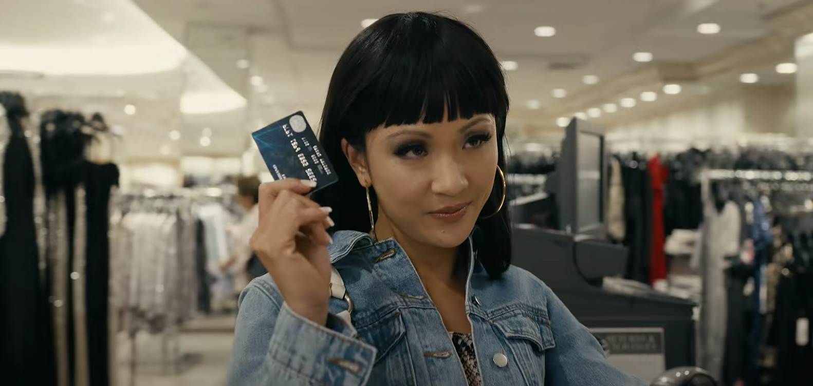 Constance Wu wearing a wig with huge bangs