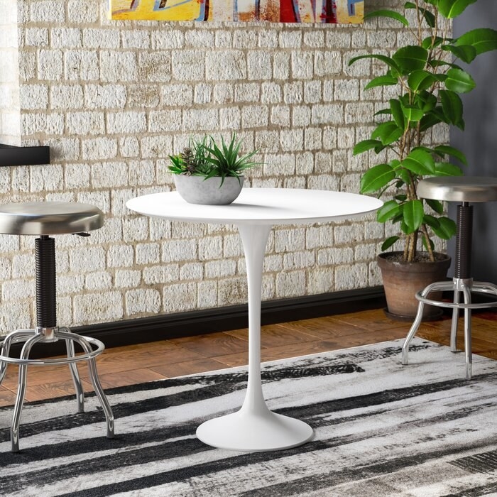 Glossy white mid-century kitchen table 