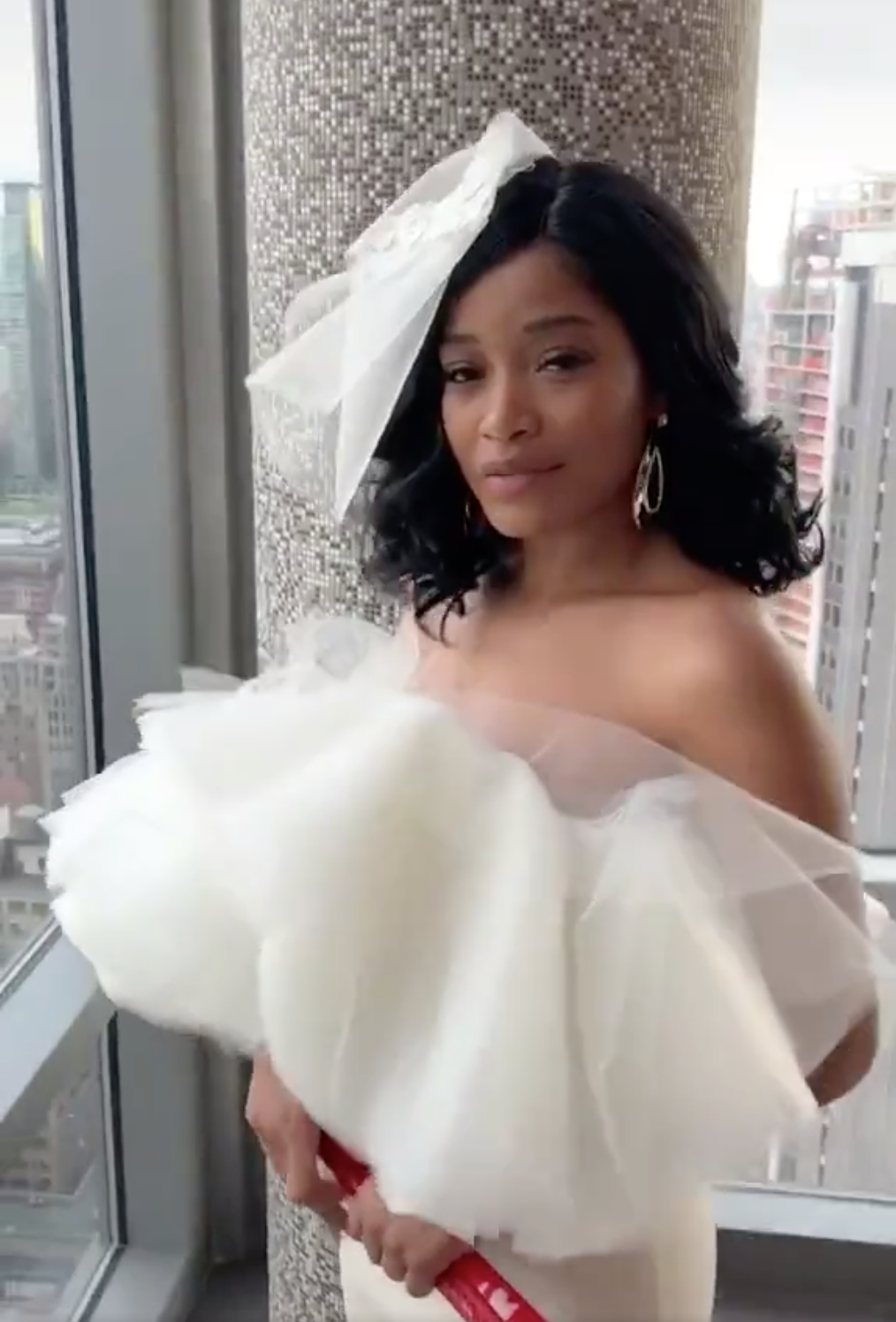 Keke poses in a dramatic designer gown as &quot;Lady Miss&quot;