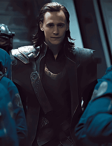 Loki walking with guards