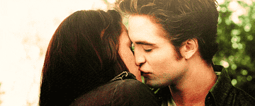 GIF of Edward and Bella pulling away from a kiss, with Edward raising his eyebrow