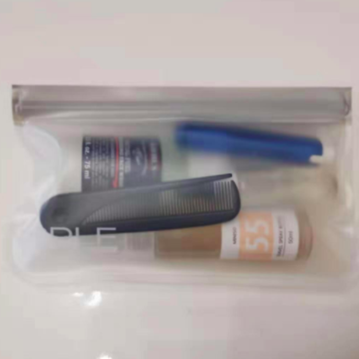 Reviewer photo showing reusable storage bag with travel toiletries inside