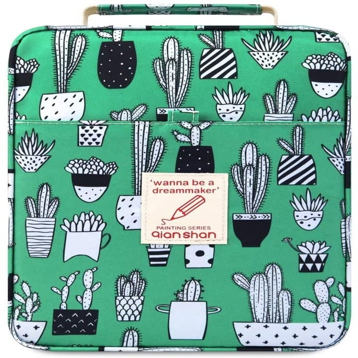 A rectangular fabric pencil case with a handle on the top