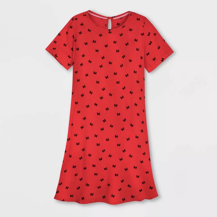 An image of a red short sleeve dress with small black bows printed all throughout