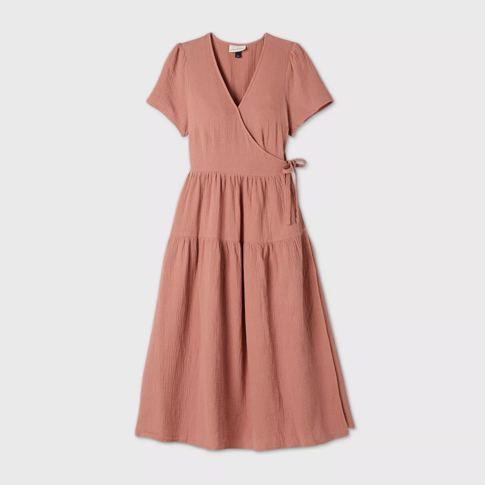 An image of a taupe wrap midi dress with a v neckline and short sleeves