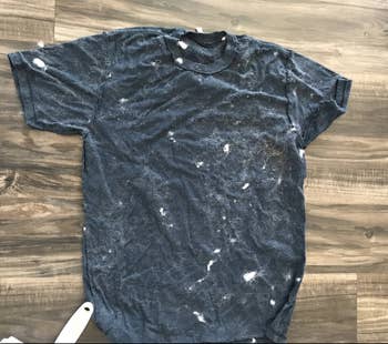 reviewer photo of t-shirt covered in pet fur