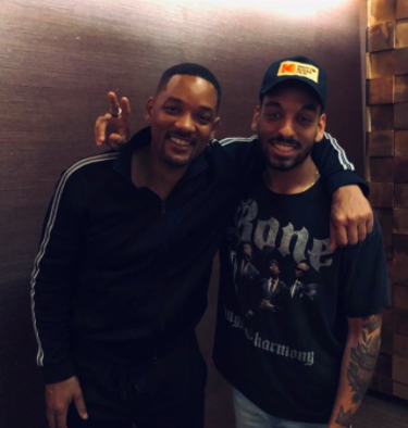 Morgan Cooper and Will Smith posing for a photo 