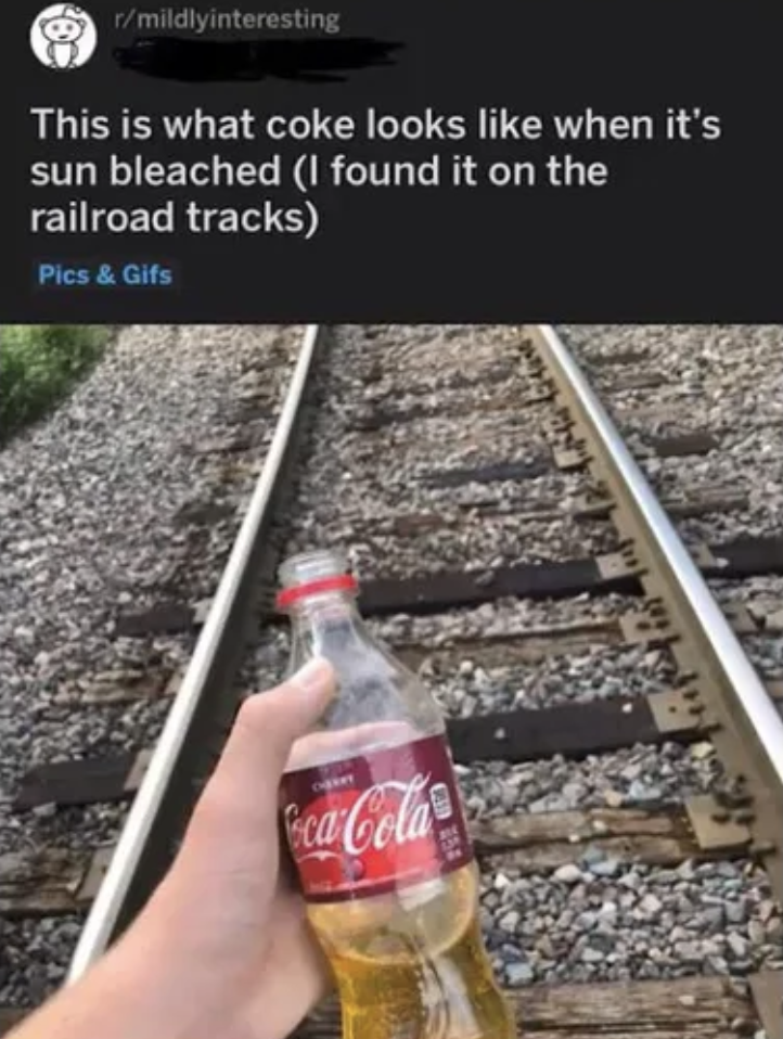 picture of a guy holding a coke bottle with yellow liquid that says this is what sunbleached coke looks like