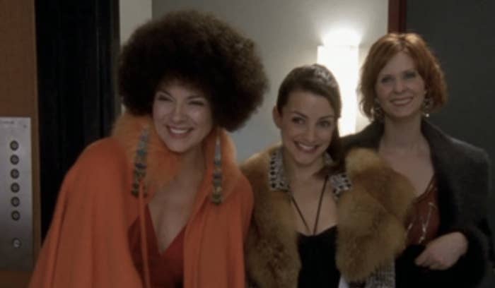 Samantha, Charlotte and Miranda visiting Carrie while Samantha wears a problematic wig