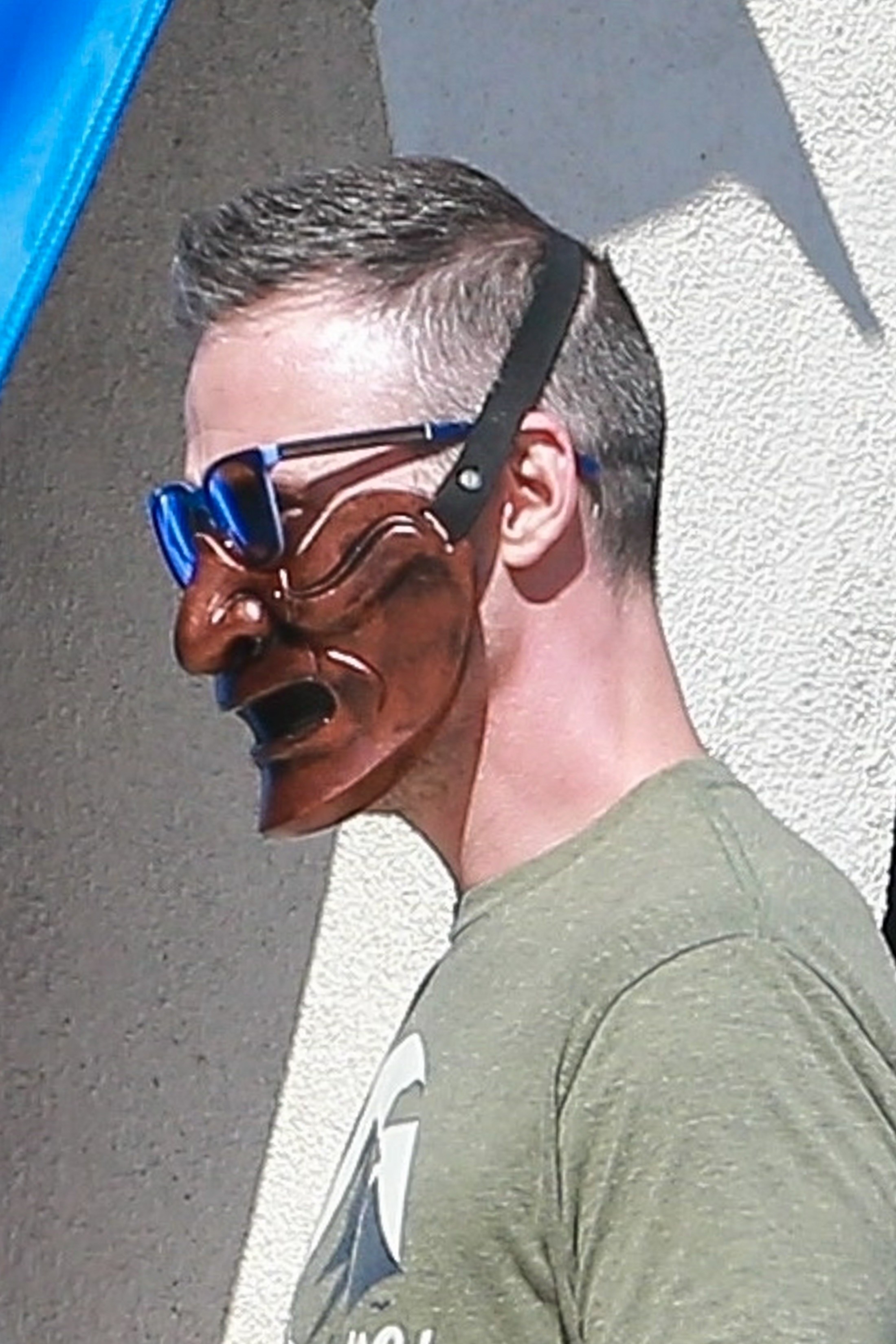 A profile pic of Freddie Prinze Jr. with a mask that looks like half of an iron man costume.