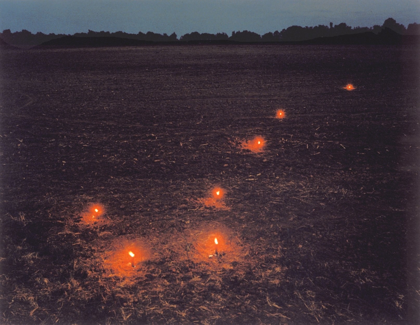 The Big Dipper is made with flares in a field 